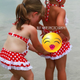 Image for article titled Drama: Mom Posts Coppertone Ad-Style Pic of Daughter on Facebook (Updated)